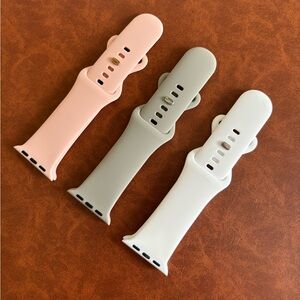 Set of three Apple Watch bands.